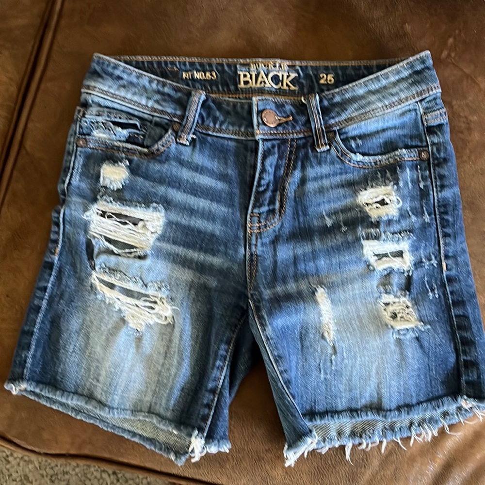 Buckle Black distressed shorts